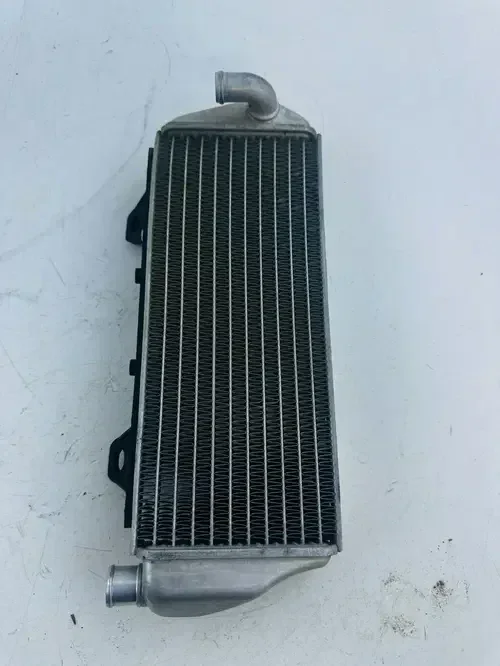 2023 KTM 150 XCW Left Non Fill Side Radiator has twist No Leaks OEM Stock